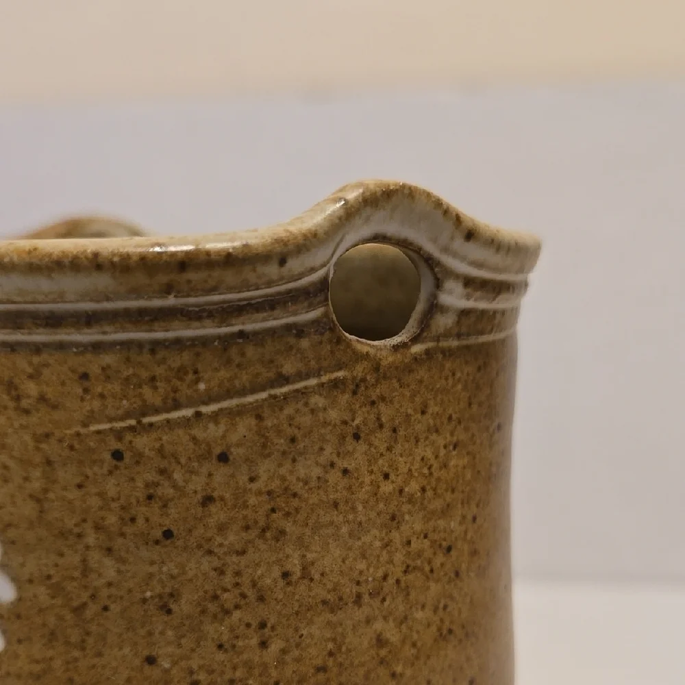 Brown Signed Pottery Vase with White Floral Design